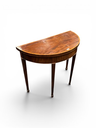 Lot 575 - A George III mahogany demi-lune card table, circa 1790