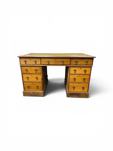Lot 365 - An Edwardian walnut veneered pedestal desk,...