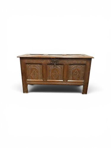Lot 685 - A three panel oak coffer chest