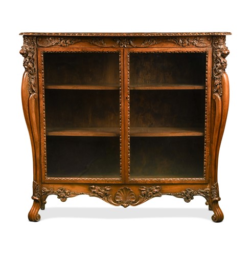 Lot 518 - A carved hardwood Colonial cabinet or bookcase, late 19th/ early 20th century