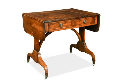 Lot 511 - A Regency yew wood veneered sofa table