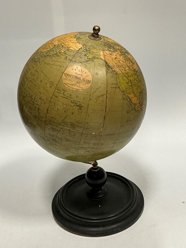 Lot 119 - A Philip's 9 inch terrestrial globe (split) on...