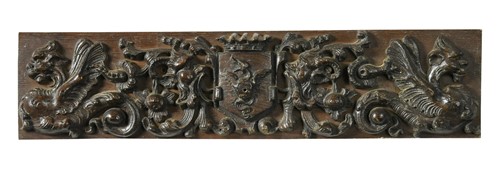 Lot 410 - A carved oak panel, 17th century