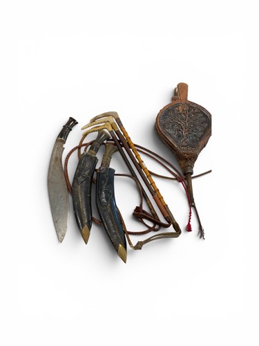 Lot 135 - Three hunting whips with circular wall-hangers,...