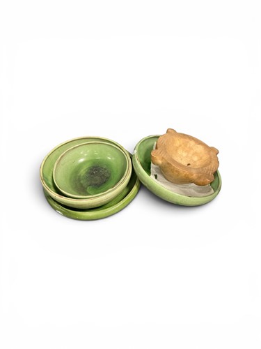Lot 48 - Four large and decorative green glazed pottery...
