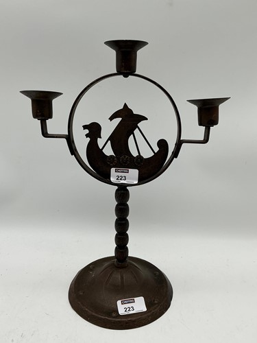 Lot 223 - In the manner of Goburg, a wrought iron and...