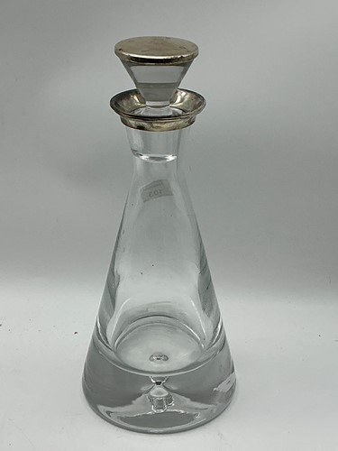 Lot 103 - A silver mounted glass decanter and stopper by...