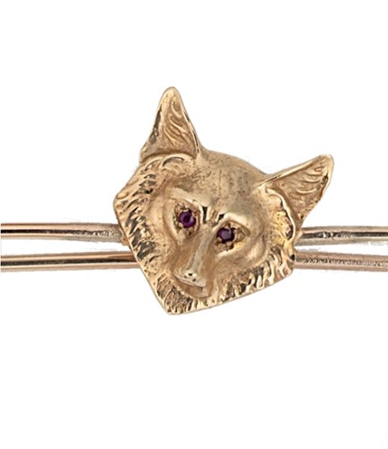Lot 55 - A fox mask brooch