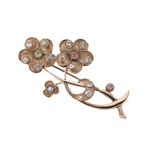 Lot 60 - A gem set floral brooch