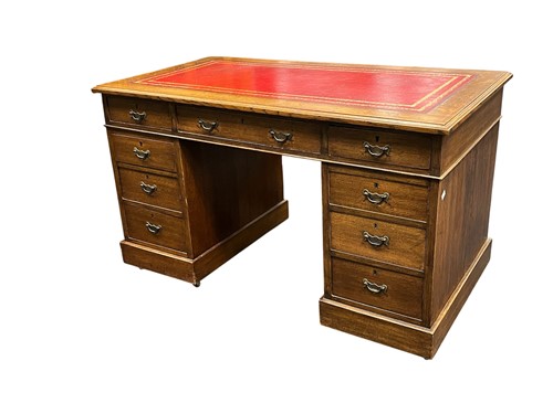 Lot 656 - An Edwardian oak pedestal desk, comprising...