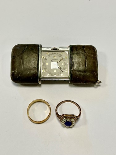 Lot 333 - A Movado travel clock together with a...
