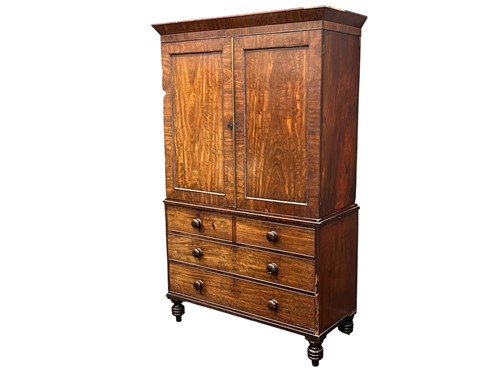 Lot 642 - A mahogany linen press, early 19th century
