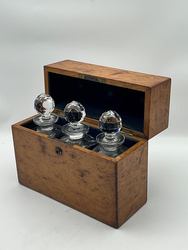 Lot 153 - A Victorian blonde oak decanter box
