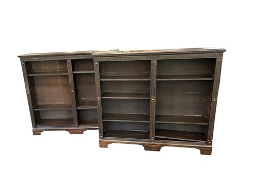 Lot 592 - A pair of carved oak open bookcases, 20th...