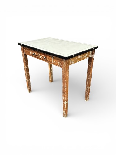 Lot 582 - A 20th century enamel-topped kitchen table