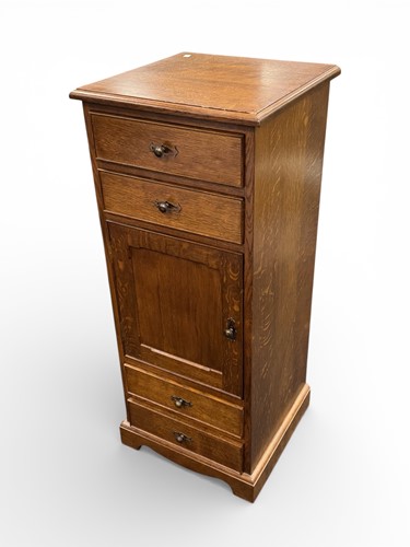 Lot 620 - A modern oak standing cupboard