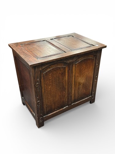 Lot 626 - An Art Nouveau oak chest with a two panelled...