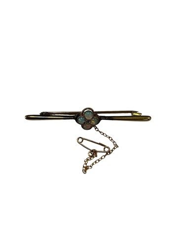 Lot 278 - An opal and diamond bar brooch, tested as 18ct...