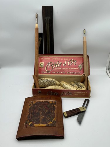 Lot 79 - A Russian icon together with various wooden...