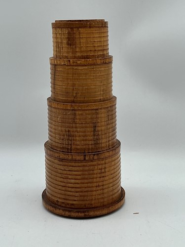 Lot 126 - A karelian birchwood spice tower comprising...