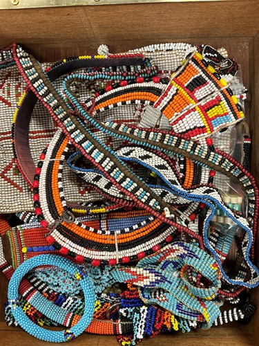 Lot 315 - A case containing mostly bead necklaces