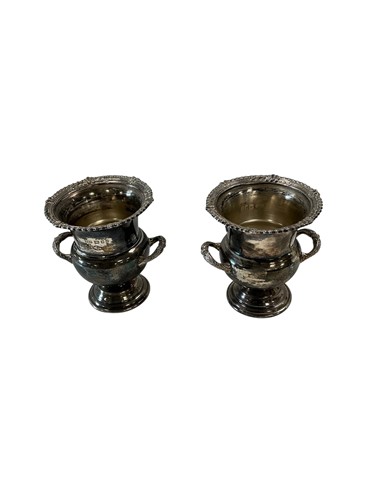Lot 324 - A small pair of silver urns, gross weight 176g...