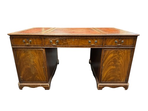 Lot 664 - A George III style mahogany partner's desk...