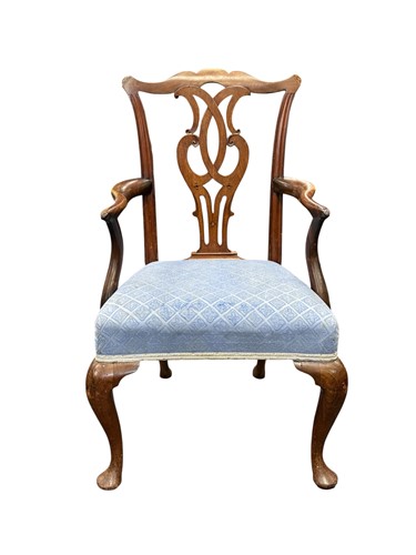Lot 643 - A George III Chippendale style mahogany elbow chair