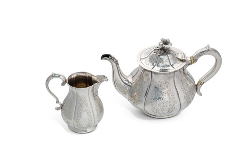 Lot 360 - A Victorian silver teapot and milk jug