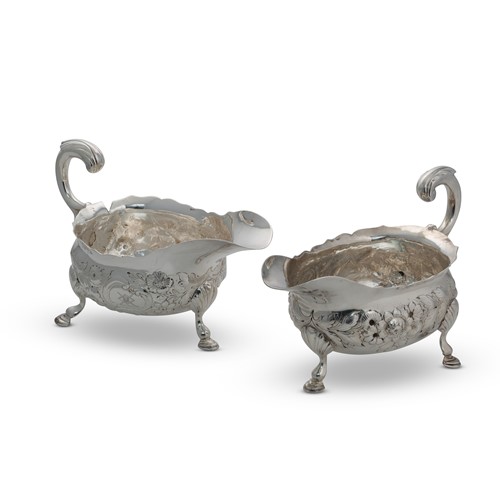 Lot 353 - A near pair of Victorian silver sauce boats