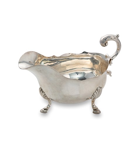Lot 405 - A George V silver sauce boat