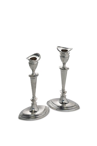 Lot 385 - A pair of Edward VII silver table candlesticks
