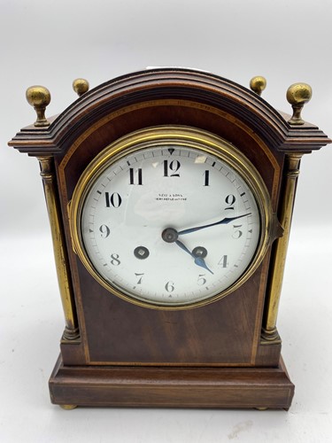 Lot 248 - A mahogany and crossbanded mantel clock early...