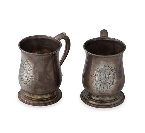 Lot 314 - A rare pair of George II silver mugs