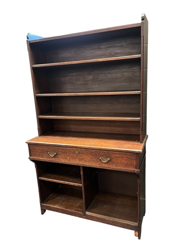 Lot 590 - An oak bookcase early 20th century, with open...