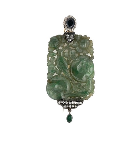Lot 93 - A carved jade, sapphire and diamond brooch