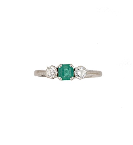 Lot 90 - A three stone emerald and diamond ring