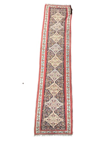 Lot 734 - A Qashqai flat weave runner with red and white...