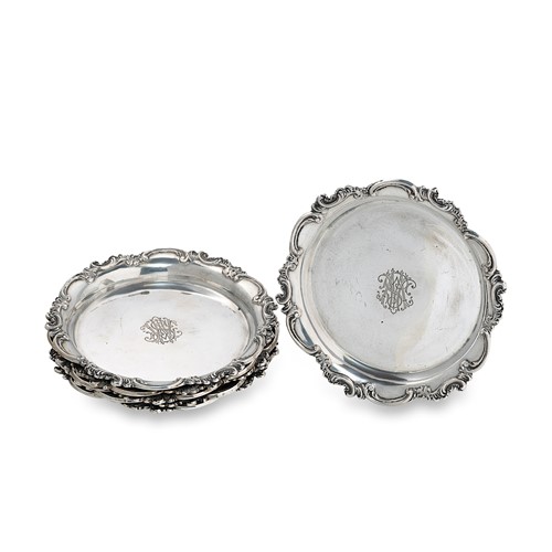 Lot 448 - A set of six Austrian silver bottle coasters