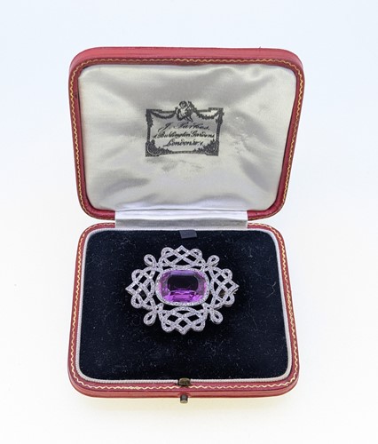 Lot 213 - An early 20th century pink topaz and diamond brooch