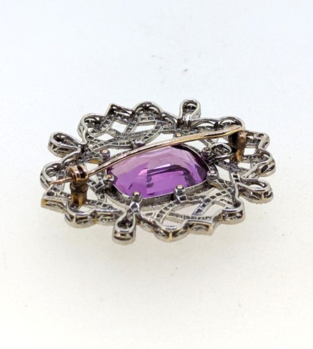 Lot 213 - An early 20th century pink topaz and diamond brooch