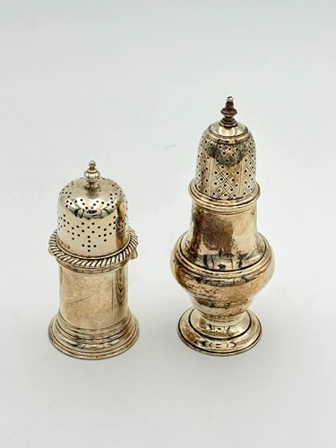 Lot 48 - Two silver pepperettes