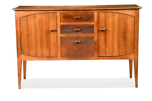 Lot 183 - Attributed to Heal's, a walnut sideboard, circa 1950
