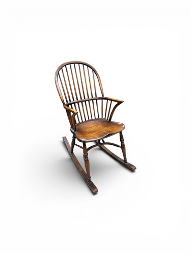 Lot 534 - A reproduction Windsor rocking chair 102cm to...