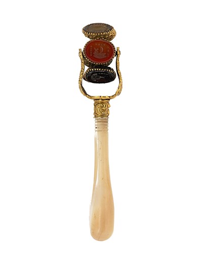 Lot 304 - A 19th century gilt metal six matrix cartwheel seal