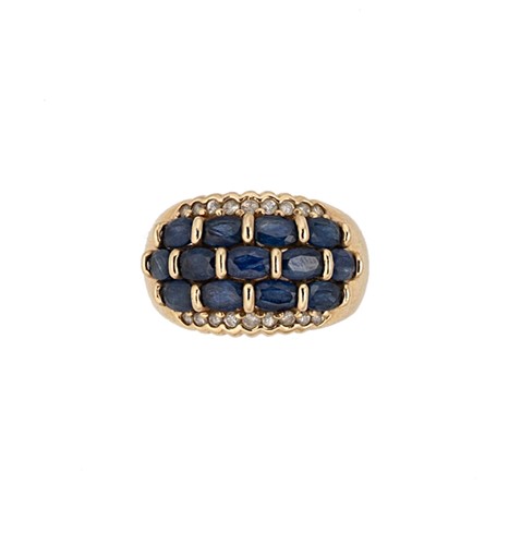 Lot 144 - A sapphire and diamond half hoop style ring