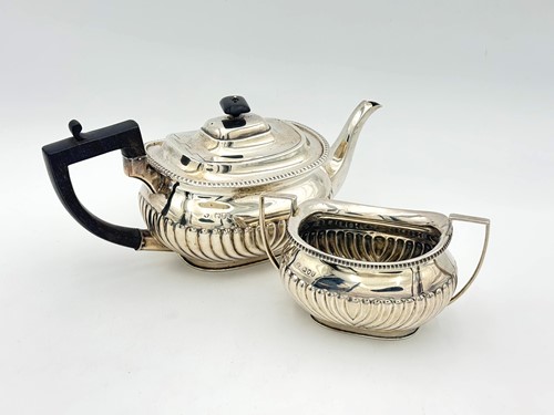 Lot 73 - A Victorian silver teapot and sugar bowl