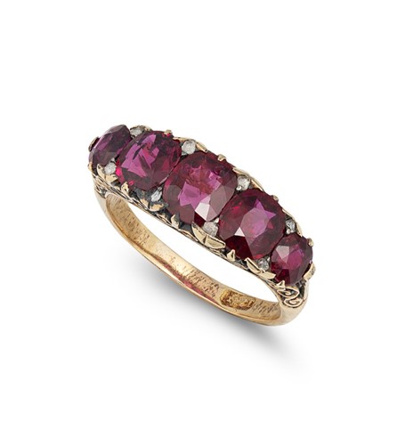 Lot 220 - A late Victorian carved half hoop five stone ruby ring