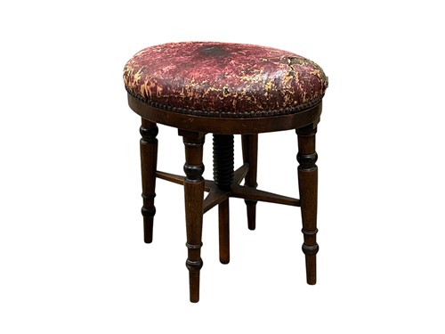 Lot 687 - A 19th century mahogany oval seated piano...