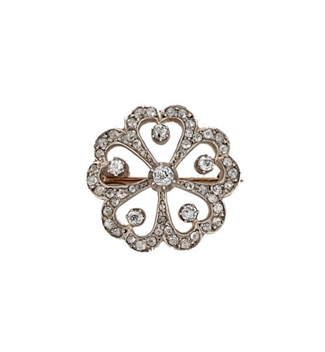 Lot 111 - An Edwardian diamond flower brooch